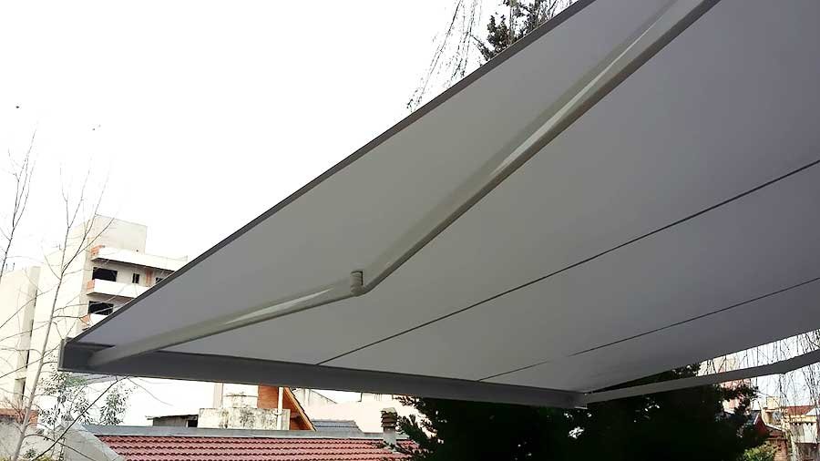 Toldo Cofre Brazos Invisibles BAT vista lateral