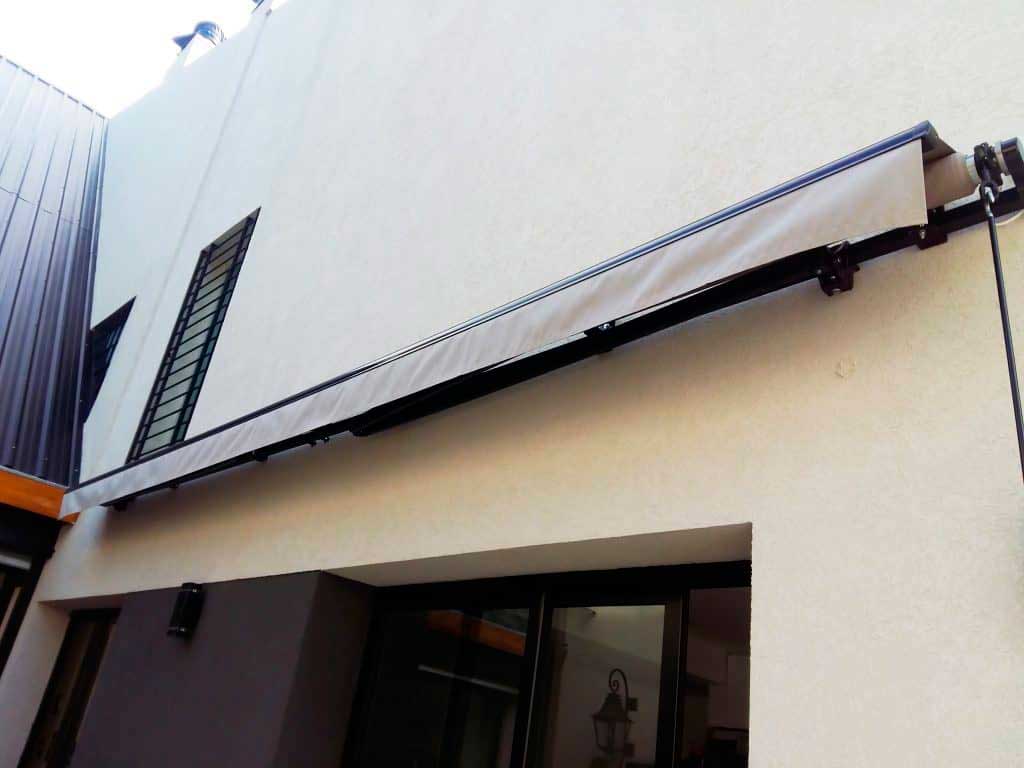 toldo brazos invisibles motor somfy a tecla