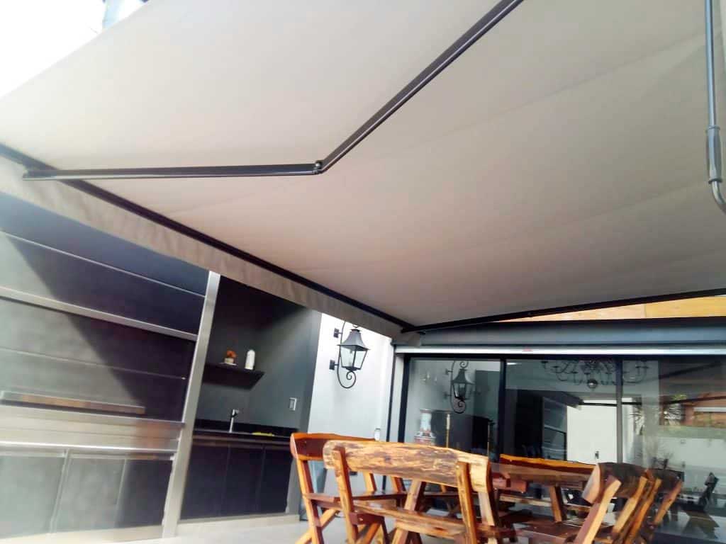 toldo brazos invisibles motor somfy a tecla